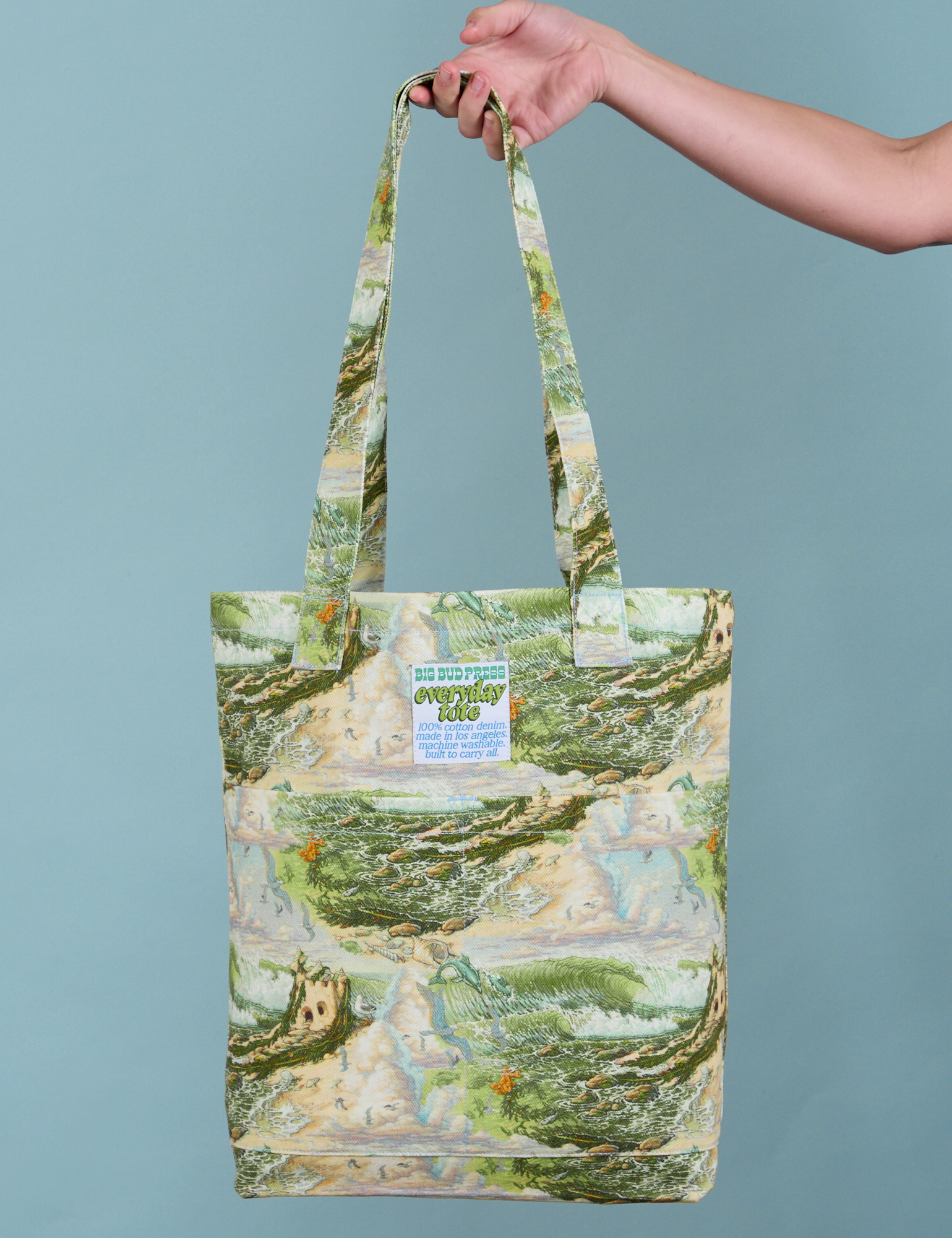Ocean and Sky Printed Everyday Tote held by person
