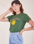 Sun Baby Organic Tee in Dark Emerald Green angled front view on Alex