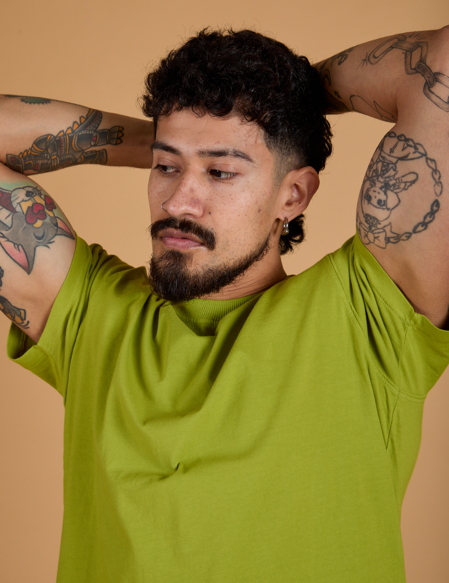 Organic Vintage Tee in Gross Green front close up on Jesse