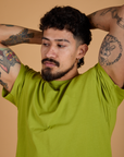 Organic Vintage Tee in Gross Green front close up on Jesse