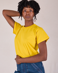 Angled front view of Organic Vintage Tee in Golden Yellow on Cheyann