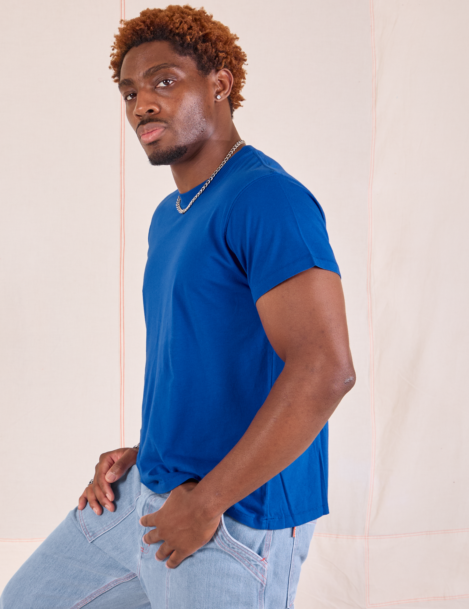 Organic Vintage Tee in Royal Blue side view on Issac