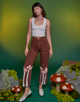 Alex is wearing Paintstamped Work Pants in Mushroom and Cropped Tank in Vintage Tee White
