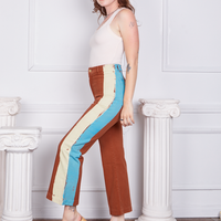 Side view of Hand-Painted Stripe Western Pants in Burnt Terracotta and vintage off-white Tank Top worn by Alex