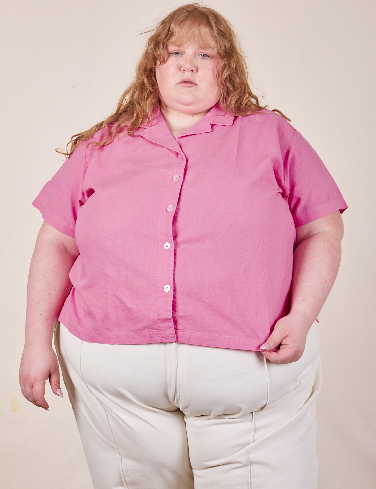 Catie is wearing Pantry Button-Up in Bubblegum Pink