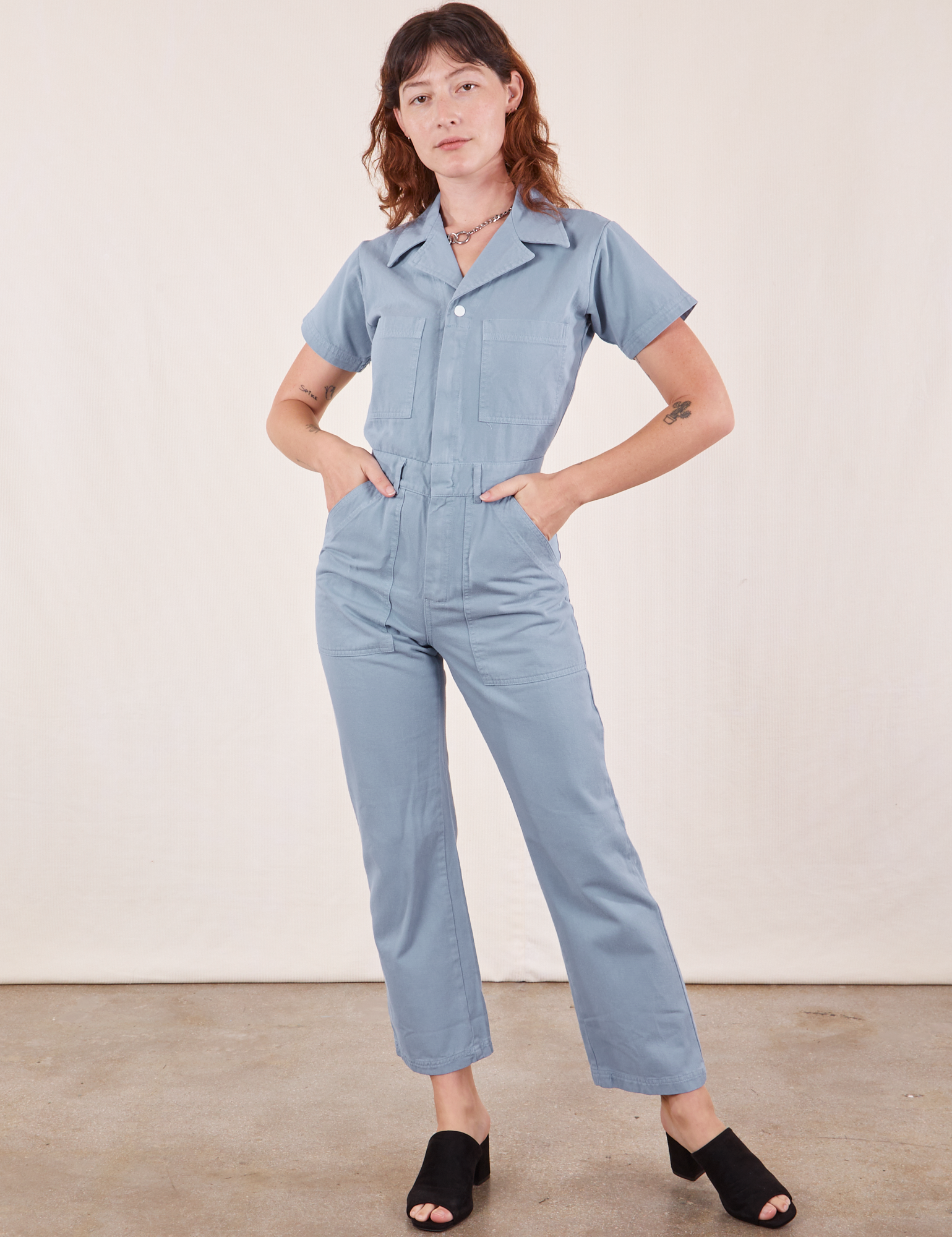 Alex is 5&#39;8&quot; and wearing XS Short Sleeve Jumpsuit in Periwinkle