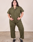 Ari is wearing Petite Short Sleeve Jumpsuit in Surplus Green