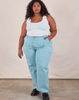 Morgan is wearing Work Pants in Baby Blue and Cropped Tank in vintage tee off-white