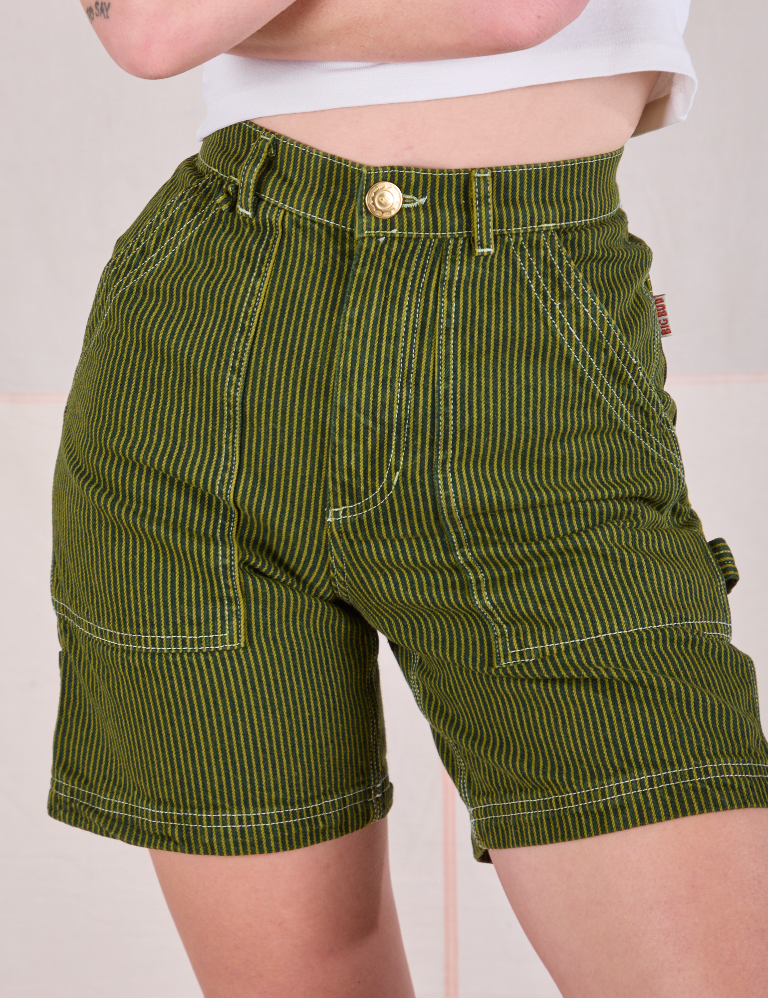 Railroad Carpenter Shorts in Summer Olive front close up on Alex
