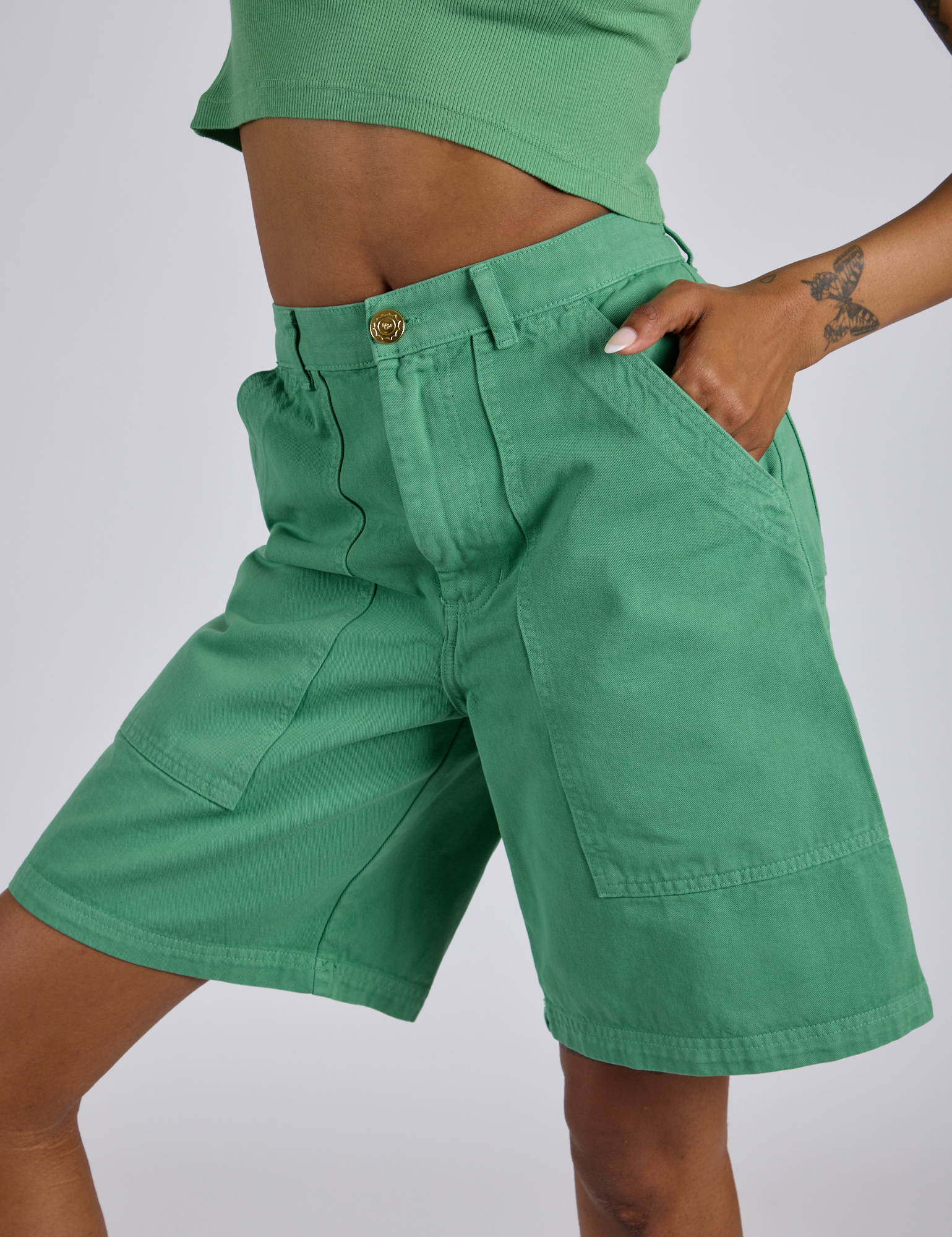 Angled front view close up of  oLongline Work Shorts in Seafoam Green Kira