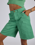 Angled front view close up of  oLongline Work Shorts in Seafoam Green Kira