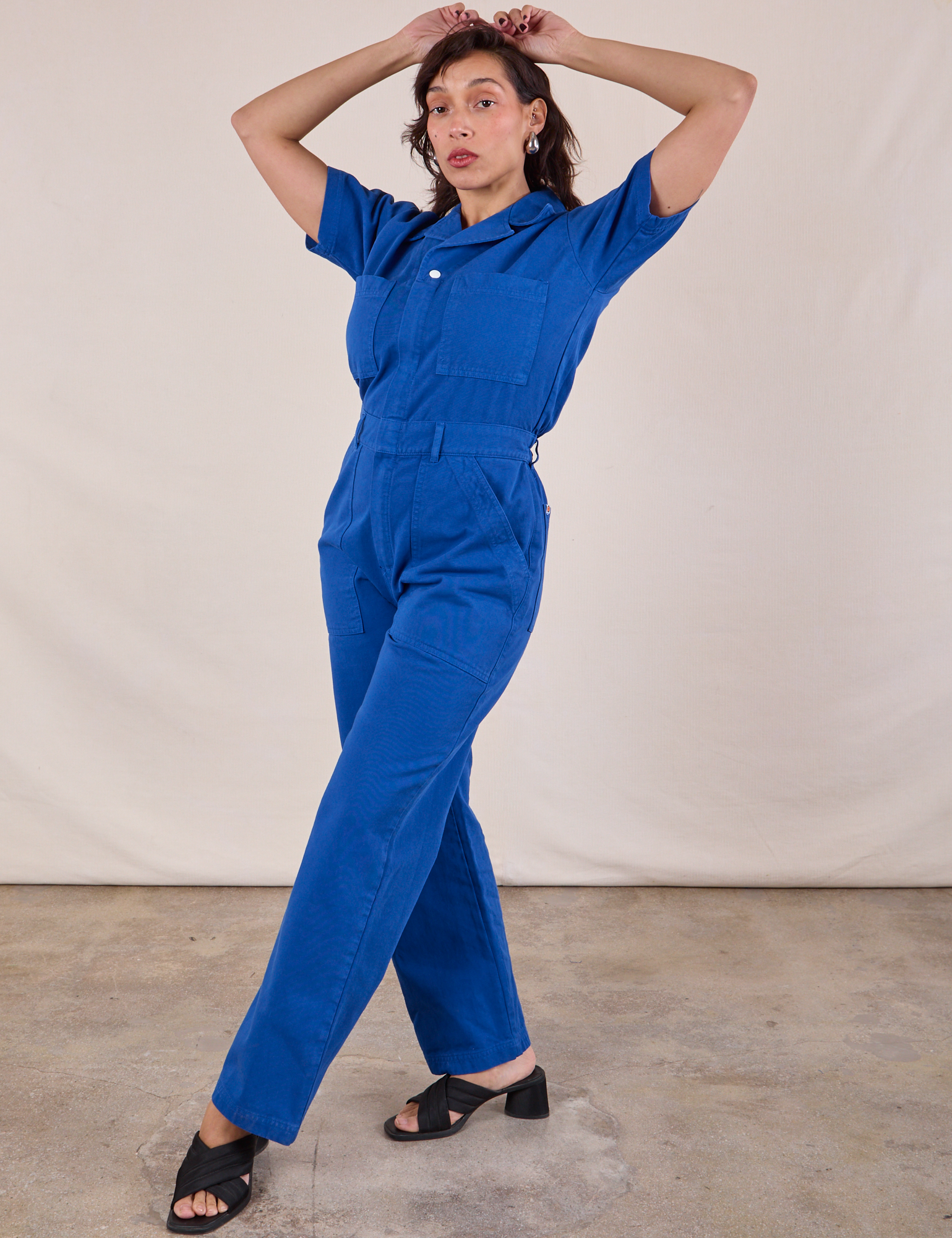 Tiara is wearing Short Sleeve Jumpsuit in Royal Blue