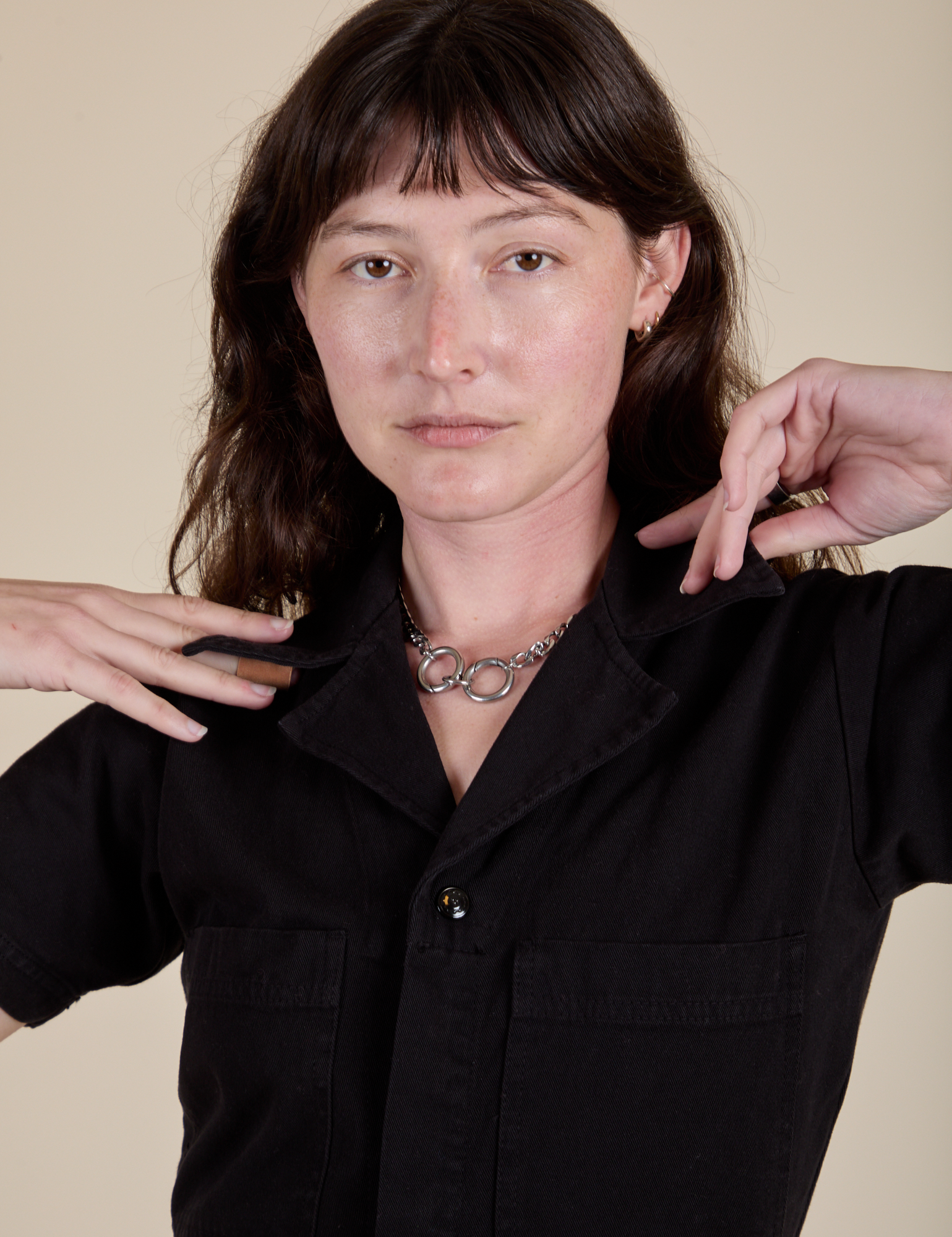 Front close up of Short Sleeve Jumpsuit in Basic Black on Alex