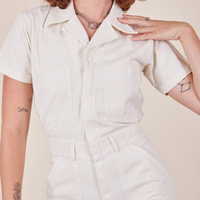 Front close up of Short Sleeve Jumpsuit in Vintage Tee Off-White worn by Alex