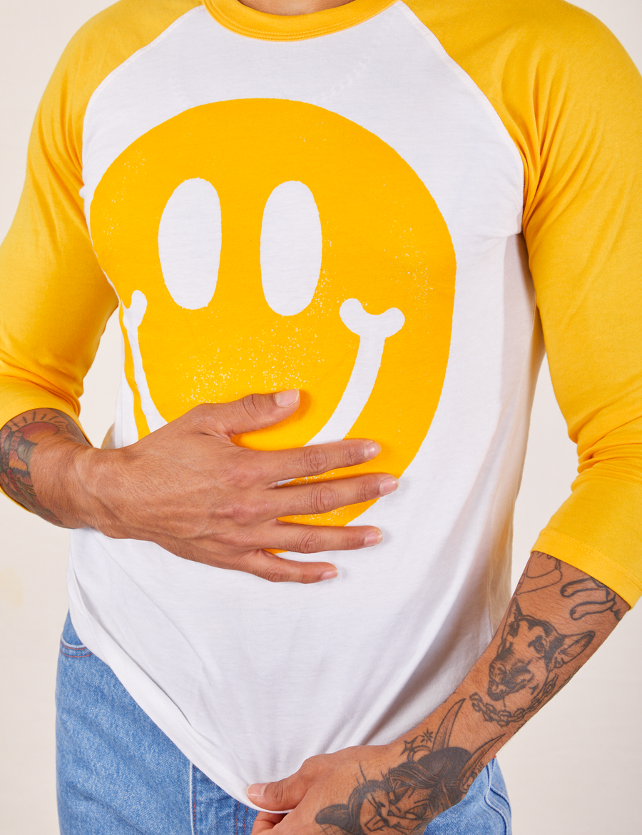 Paintstamp Smiley Raglan Tee front close up on Jesse