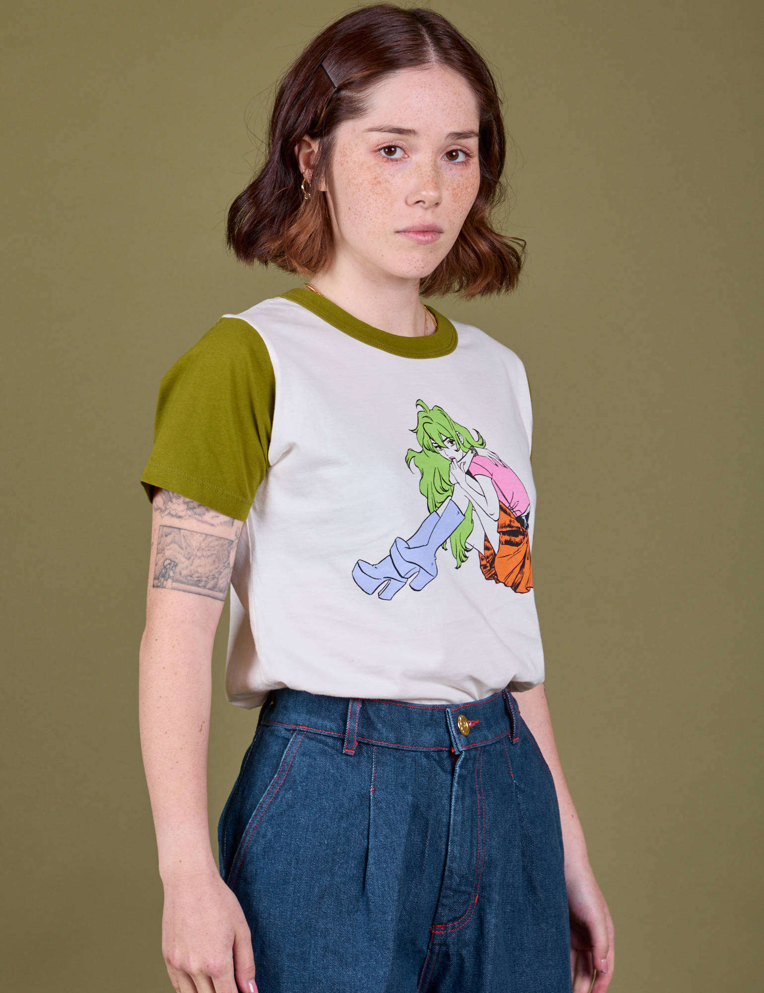 Olive Lottie Tee angled front view on Hana