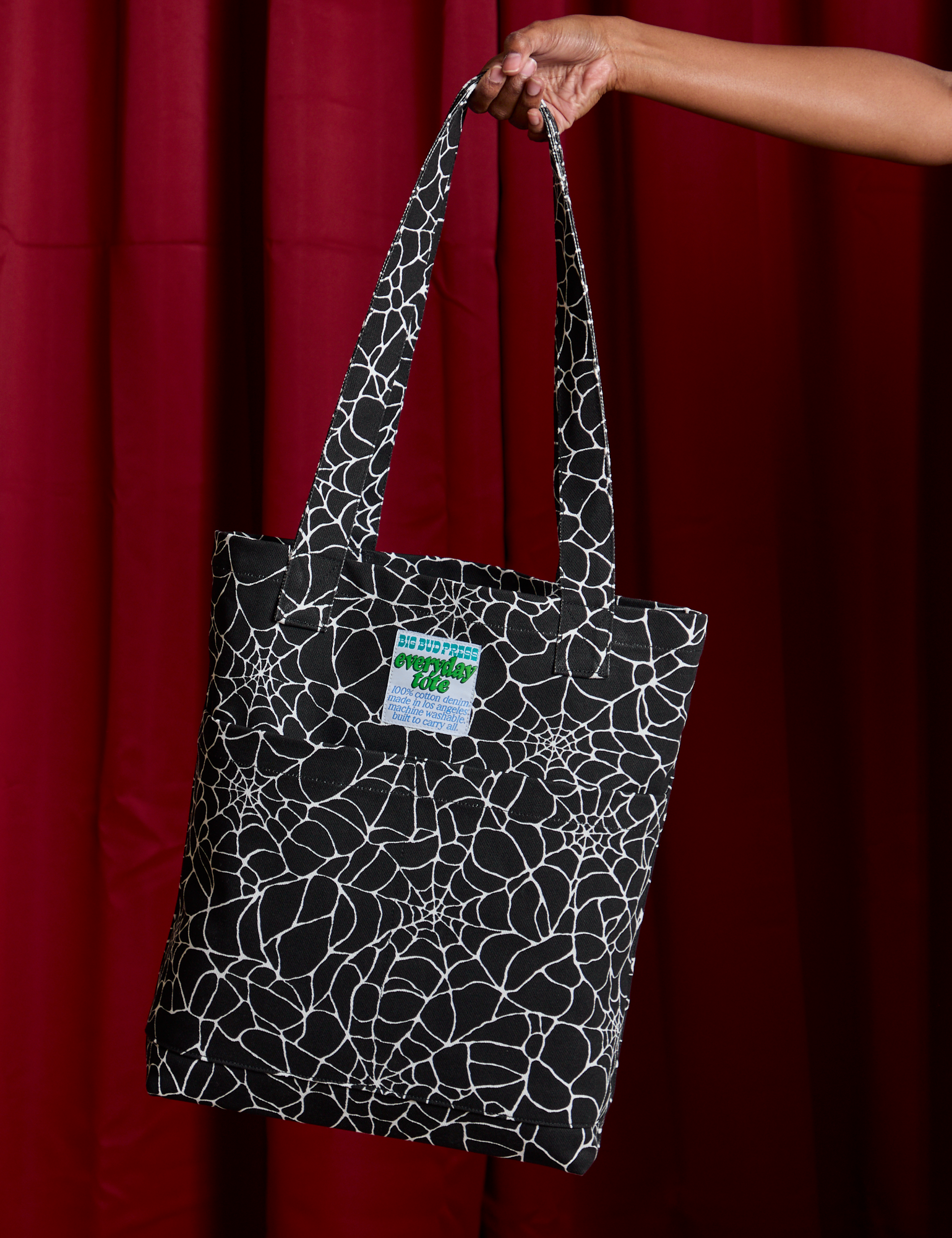 Spider Webs Printed Everyday Tote held by model