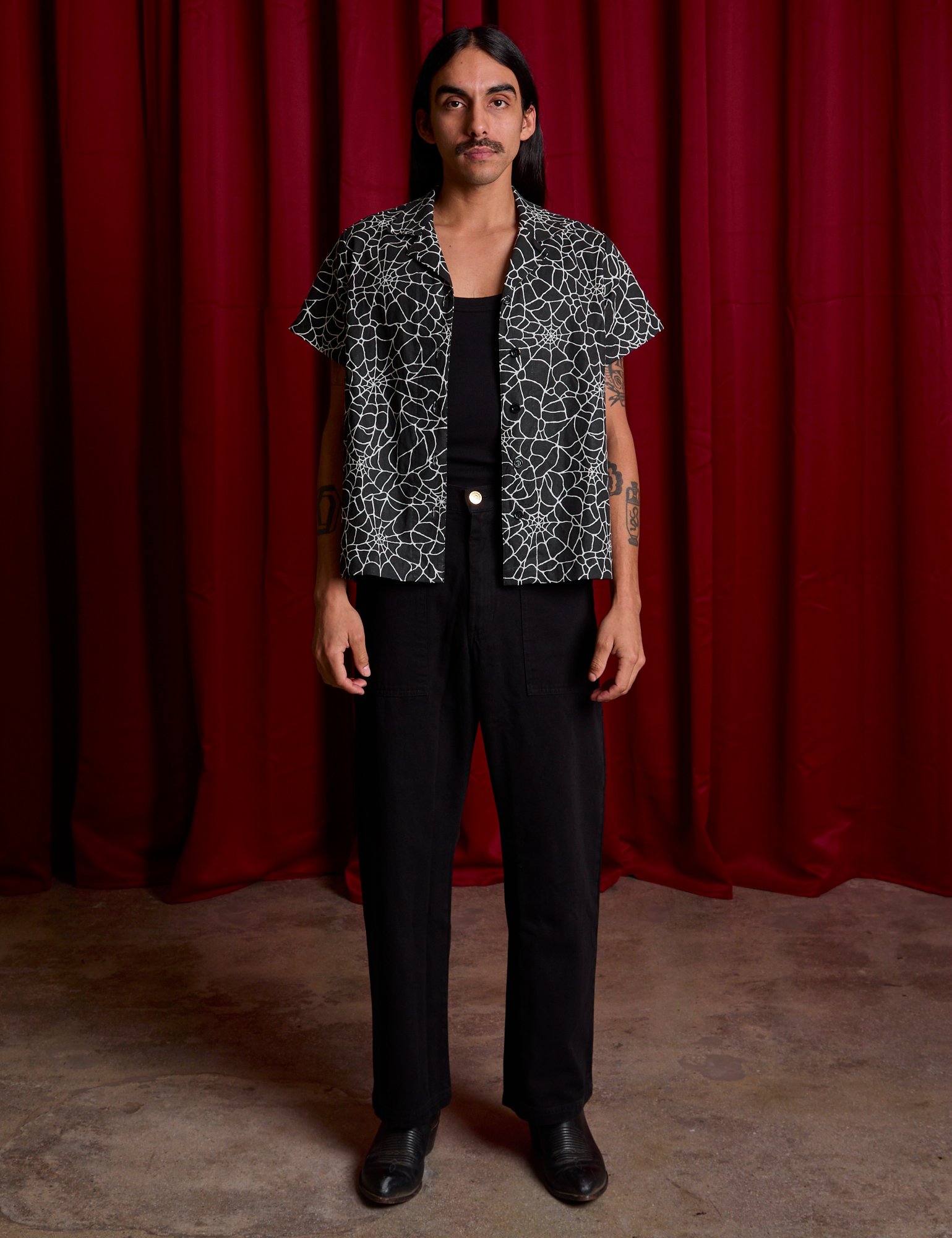 Spider Webs Pantry Button-Up and black Work Pants on Anthony