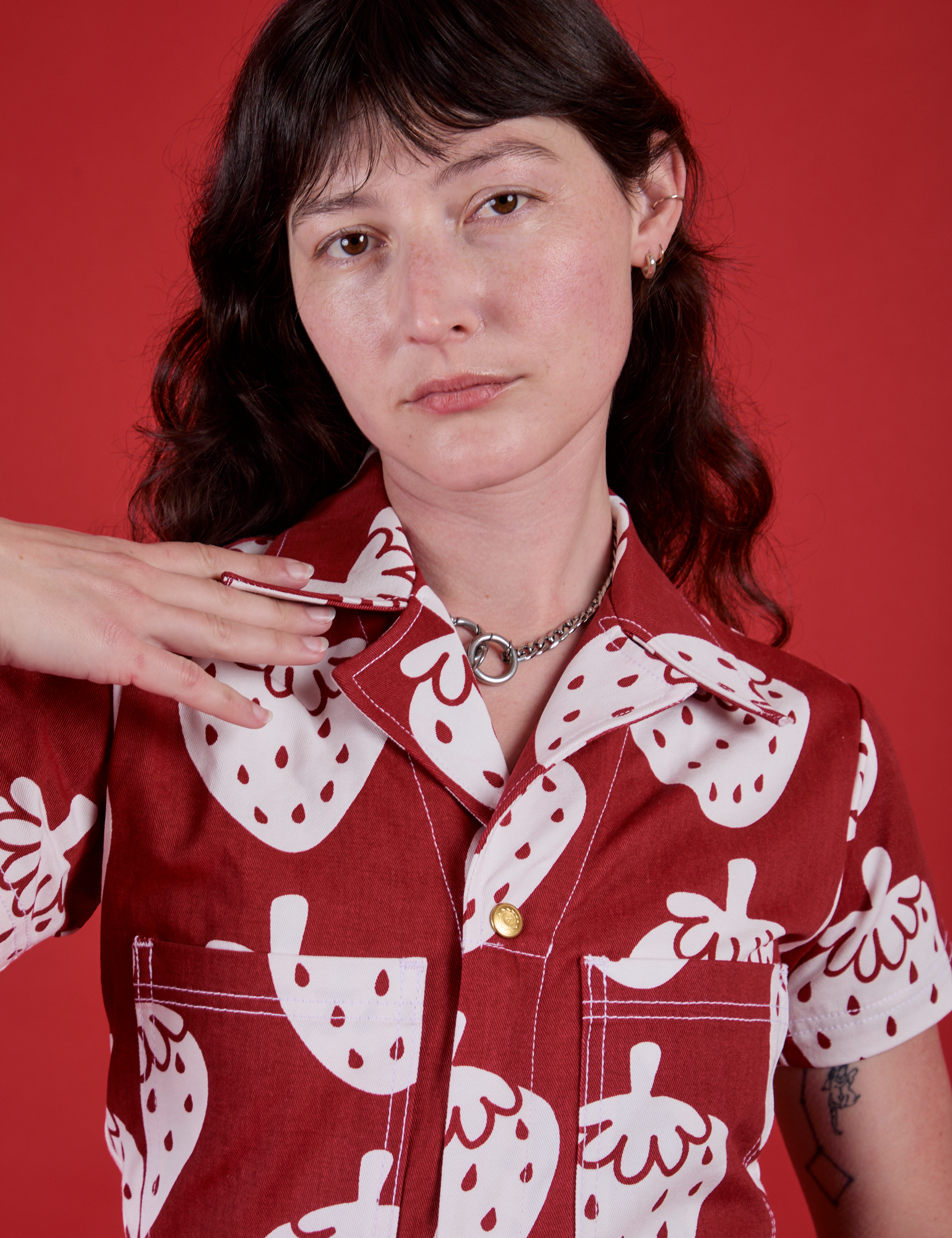 Front close up of Strawbaby Jumpsuit on Alex