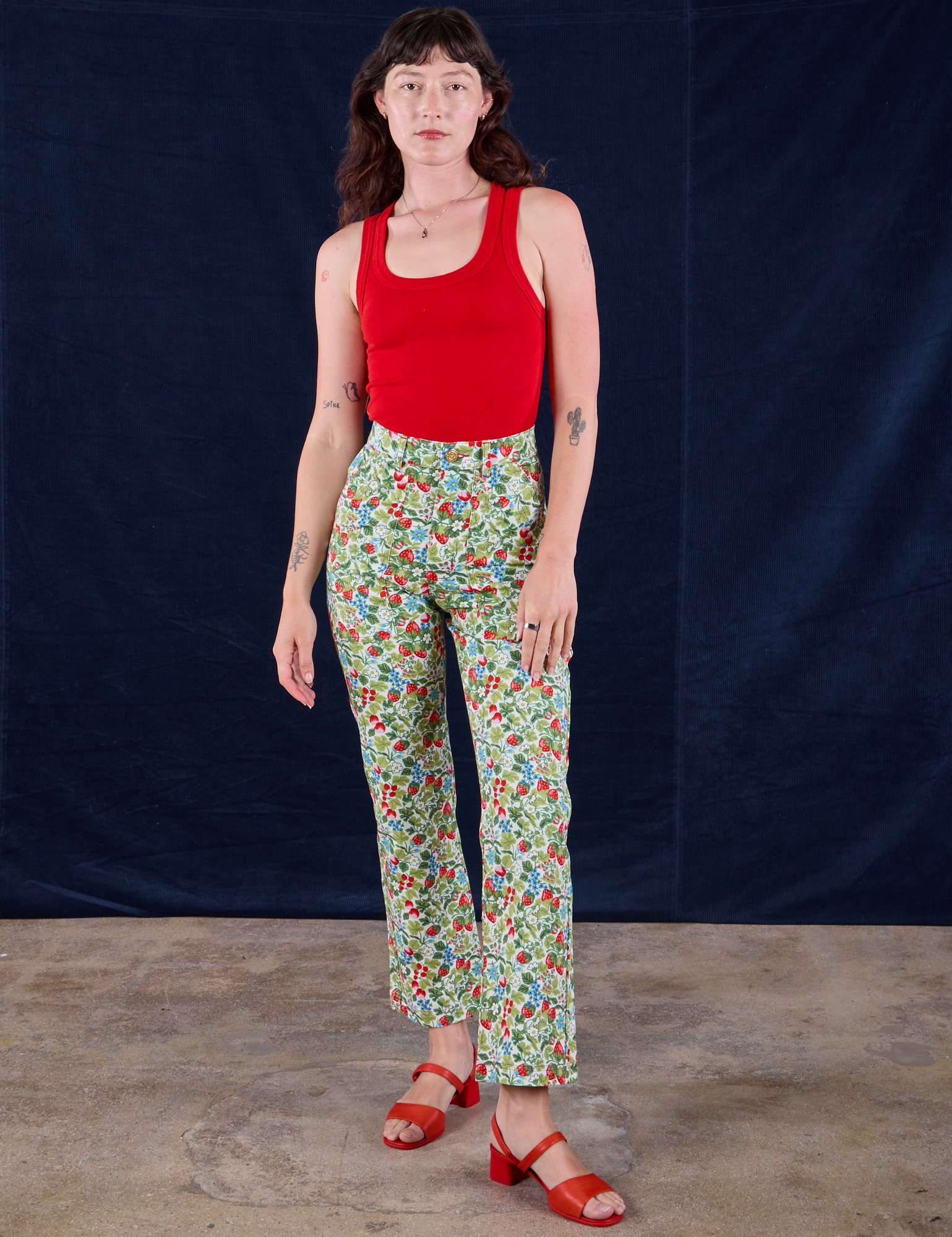 Work Pants in Strawberry Blossom and mustang red Tank Top on Alex