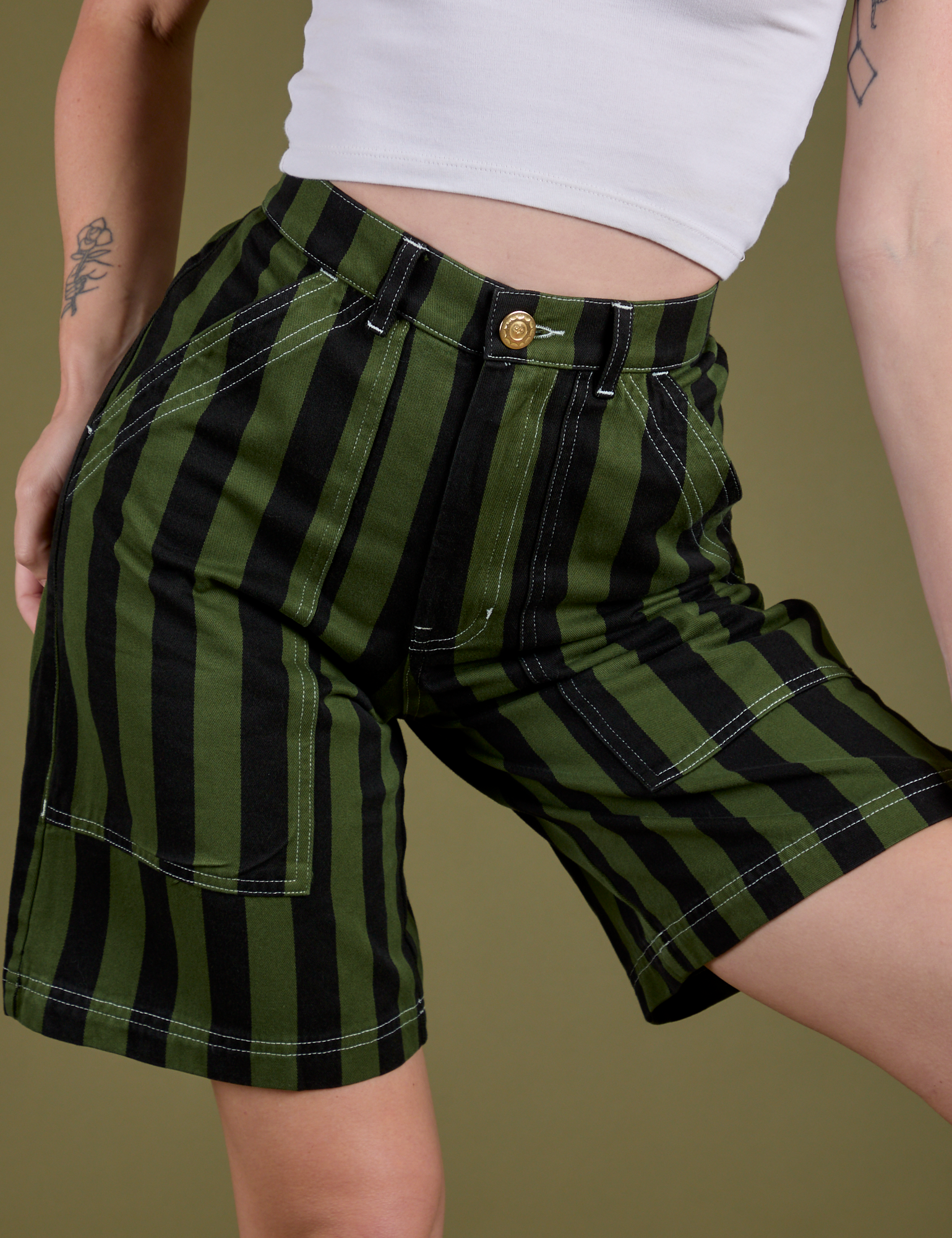 Longline Work Shorts in Evergreen close up on Alex