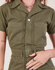 Short Sleeve Jumpsuit in Surplus Green close up on Alex