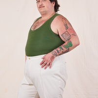 Tank Top in Dark Emerald Green side view on Sam wearing vintage off-white Western Pants