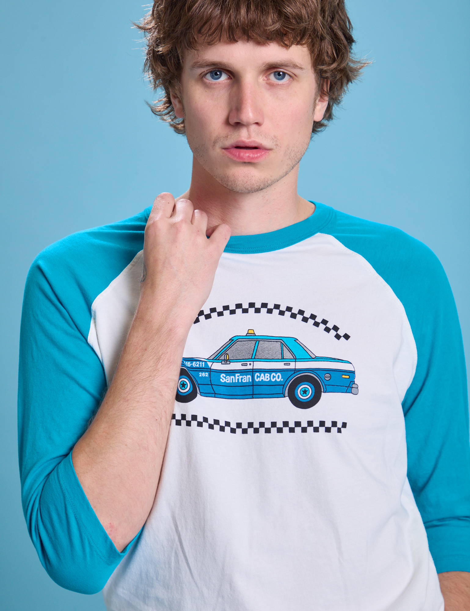 Taxi Raglan Tee in San Francisco front close up on Quinn