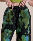 Magic Waters Drop Pocket Pants in Green Pool front close up on Alex