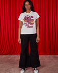 Kandia is wearing Cheetah Organic Tee and black Bell Bottoms