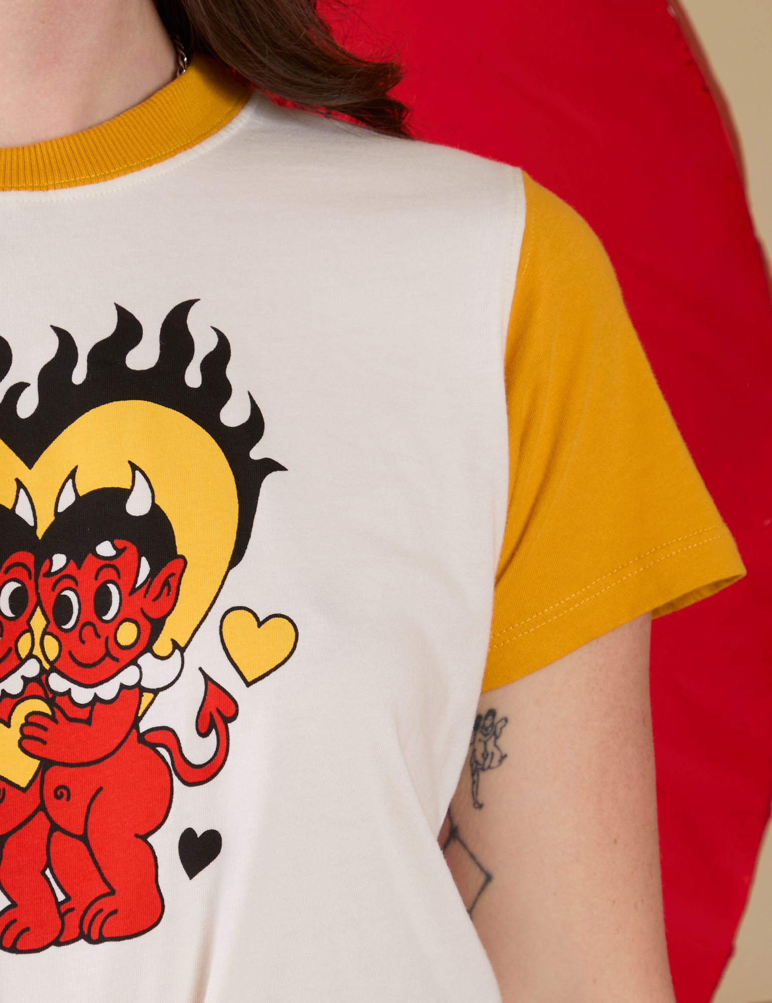 Vintage Tee in Devil Lovers front shoulder close up on Alex