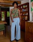 Jerrod is wearing Kitchen Collection Racerback Tank and light wash Indigo Wide Leg Trousers