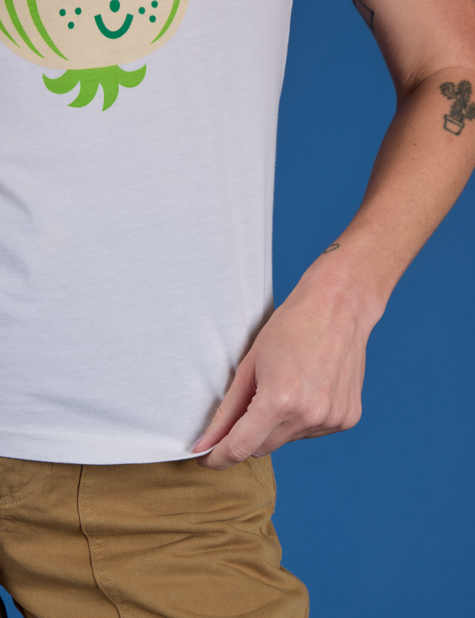 Produce Raglan Tee in Onion close up on Alex