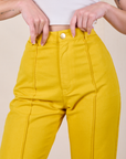 Western Pants in Golden Yellow front close up on Alex