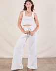 Alex is wearing Wide Leg Sweat Pants in Vintage Tee Off-White  and Cropped Tank