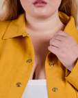 Denim Work Jacket in Mustard Yellow front close up on Juliet