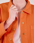 Denim Work Jacket in Construction Orange front close up on Quinn