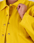 Denim Work Jacket in Golden Yellow front close up on Morgan