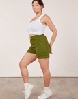 Side view of Classic Work Shorts in Summer Olive and Cropped Tank Top in vintage tee off-white on Tiara