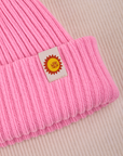 Ribbed Beanie close up with sun baby tab