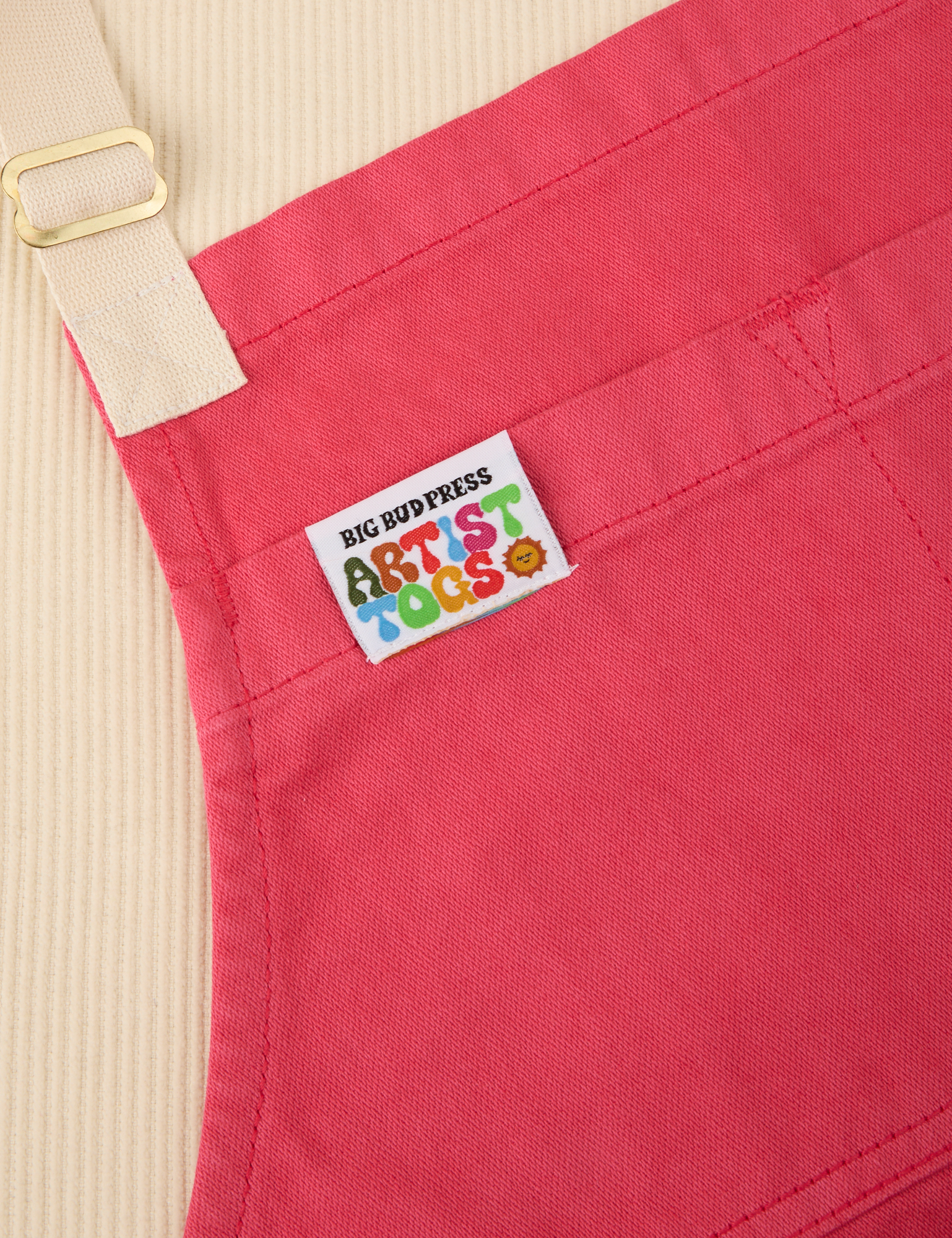 Full Denim Apron in Hot Pink close up