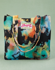 Rainbow Magic Waters Shopper Tote with straps hanging down the front