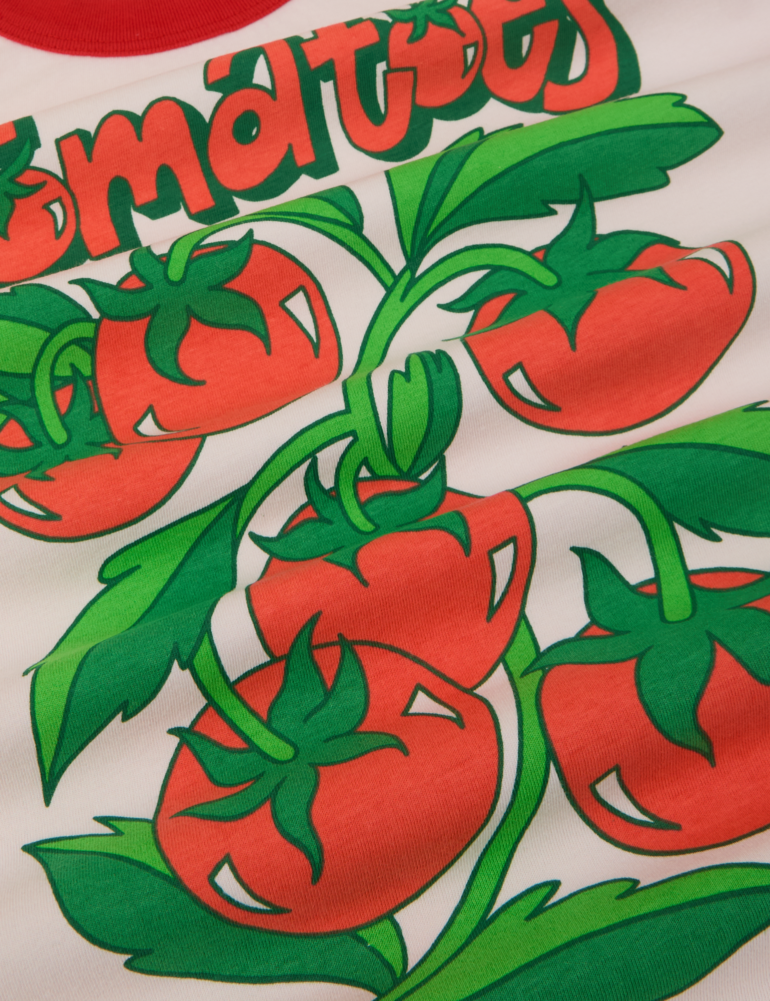 Close up of red tomatoes on a green vine graphic