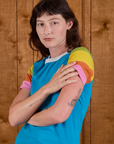 Calypso Tee in Rainbow angled front view on Alex
