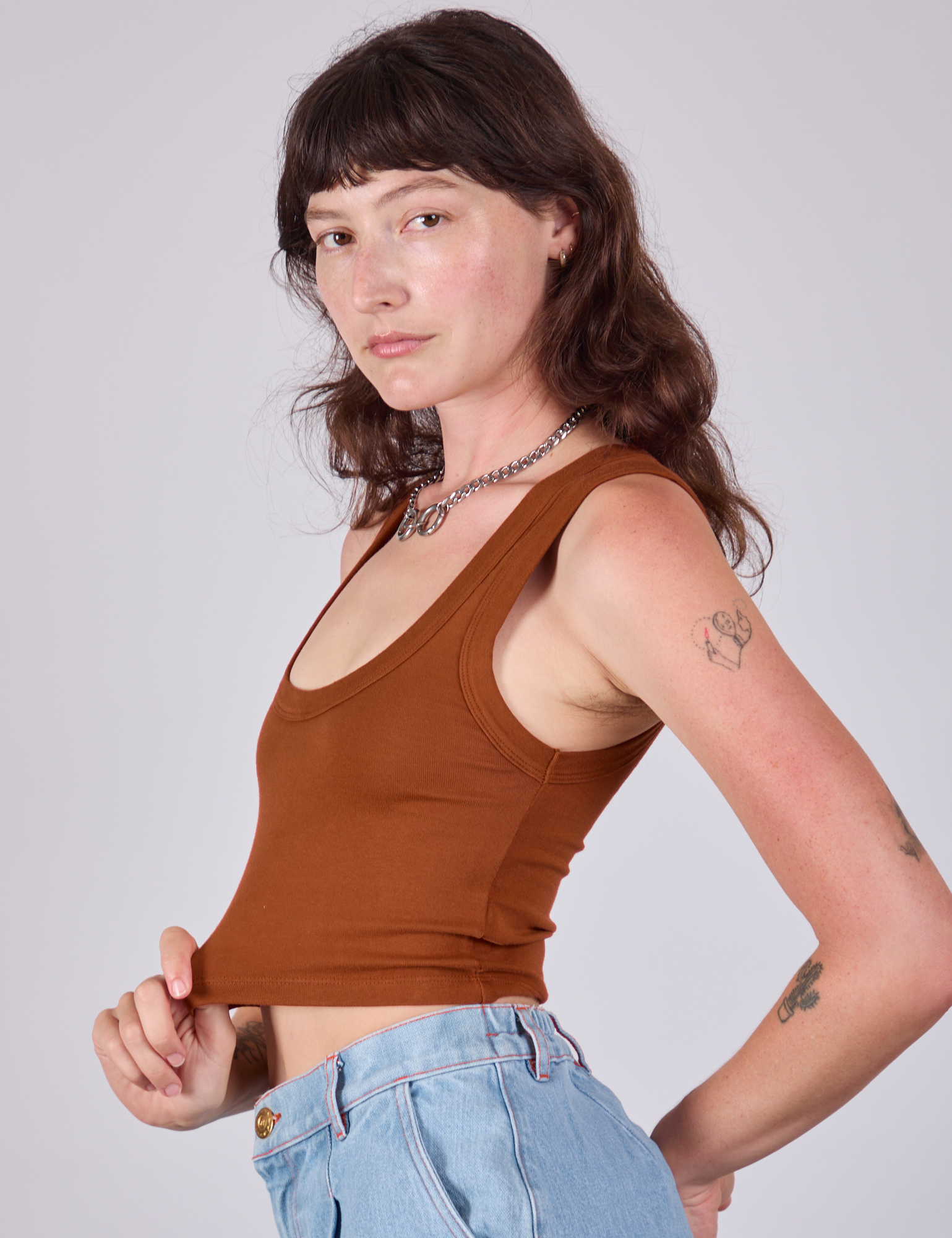 Cropped Tank Top in Burnt Terracotta side view on Alex