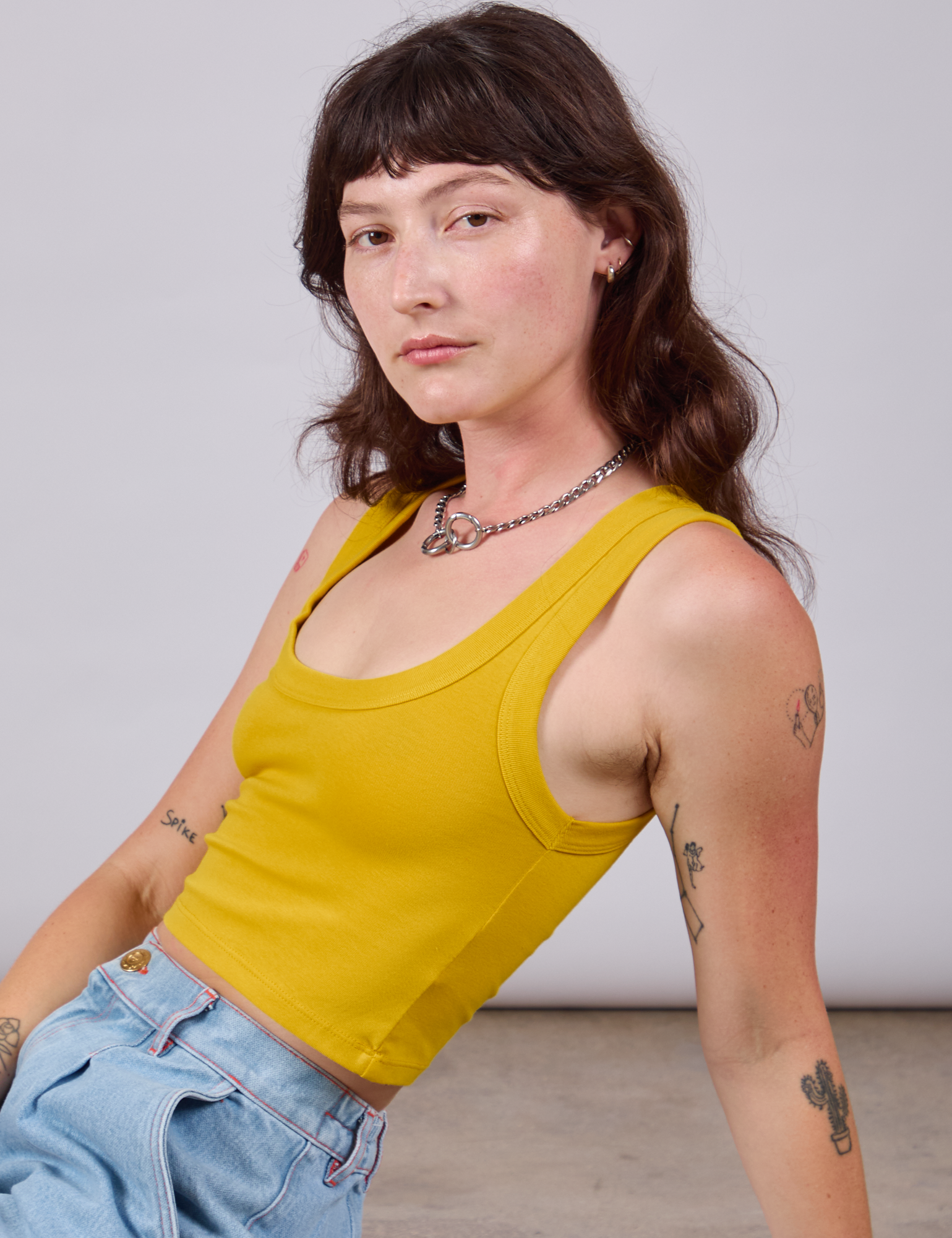 Cropped Tank Top in Golden Yellow side view on Alex