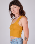 Cropped Tank Top in Mustard Yellow side view on Alex