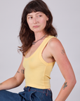 Cropped Tank Top in Butter Yellow side view on Alex