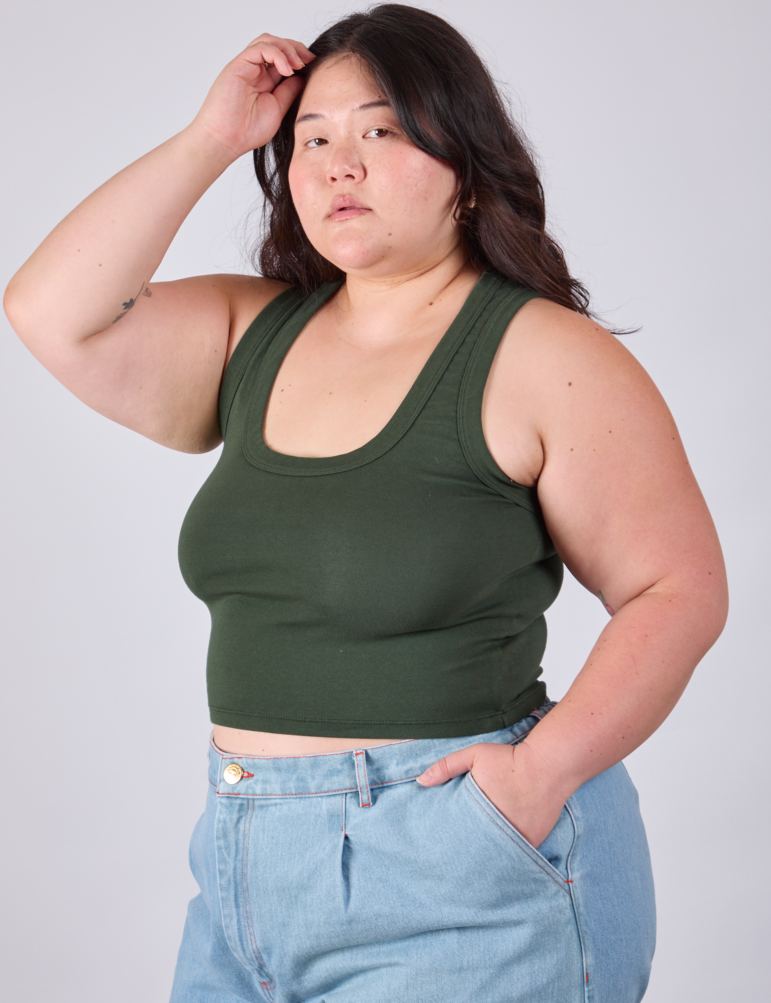 Cropped Tank Top in Swamp Green angled front view on Ashley