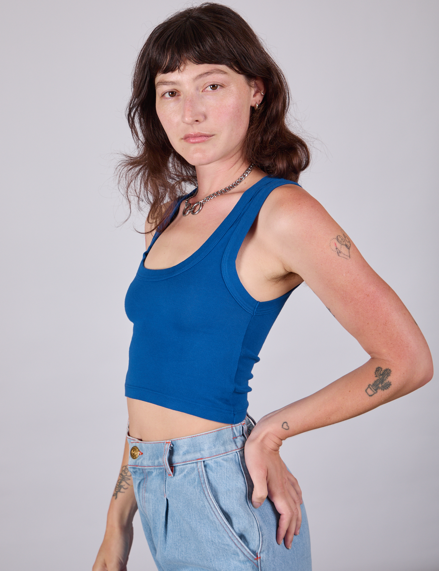 Cropped Tank Top in Royal Blue side view on Alex